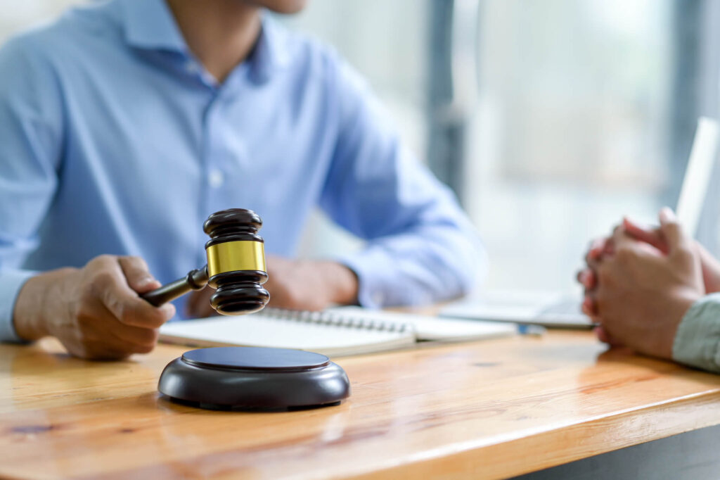 close up shot of lawyer holding a hammer giving ad 2021 08 29 10 12 38 utc